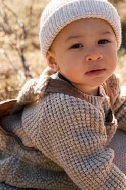Atlas, Beanie